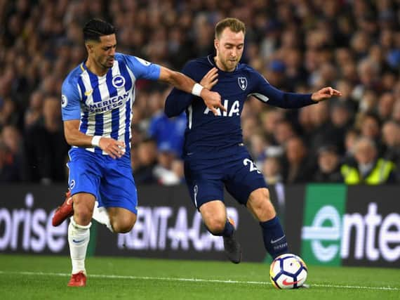 Markus Suttner battles with Christian Eriksen. Picture courtesy of Getty Images