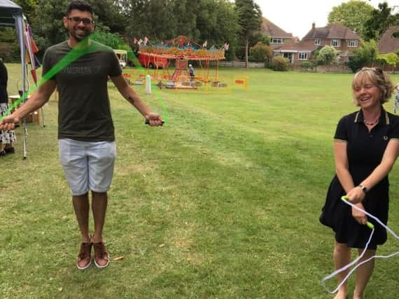 Business development lead Monil Chouhan, left, and executive director Nichola Evans skipping