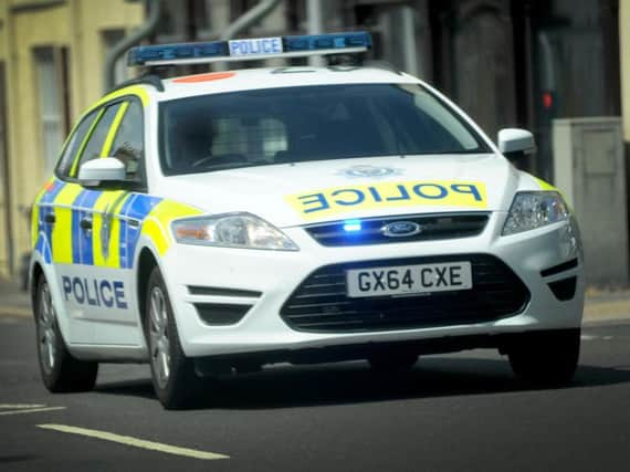 A woman has been taken to hospital after an accident in a car park in Shoreham