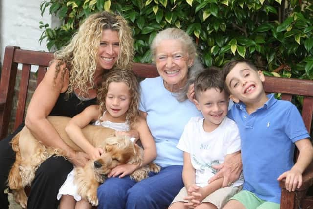 Ruth Brass, daughter Jess Brass and children Henry 7 and twins Milo and Pi aged 6, and Digby the dog. Photo by Derek Martin Photography