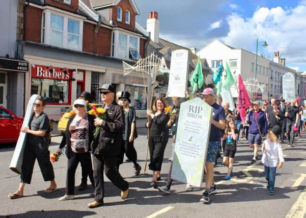 Protesters marching through town