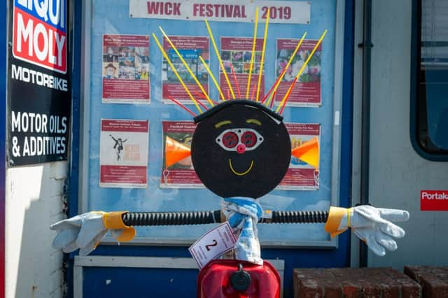 Wick, Littlehampton, West Sussex, UK. 24th August 2019. The Wick Village Scarecrow Festival, organised by the Wick Village Traders Association and held during the Wick Festival. In Pic: The Going Spare scarecrow.