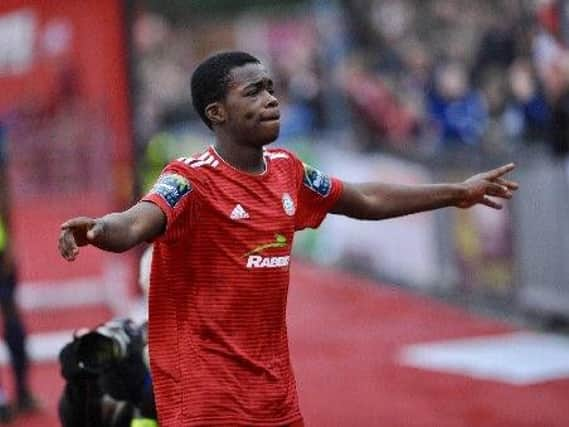 Kwame Poku celebrates after netting for Worthing last season. Picture by Stephen Goodger