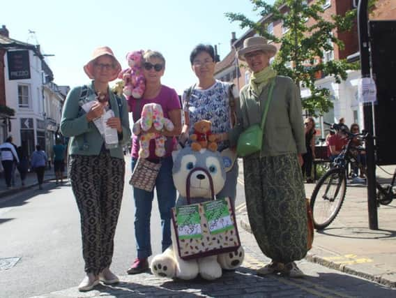 Volunteers Carley Sitwell, Debbie Carter, Helen Cato and Ping Jiang with the toys they will bring to the car free day event in Chichester, if the road closure order is reinstated