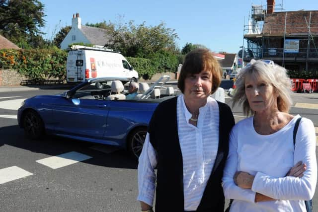 ks190515-1 Felpham Roundabout  phot kate
Councillors Elaine Stainton, left, and Gill Madeley by the new road layout in Felpham.ks190515-1 SUS-190917-184726008