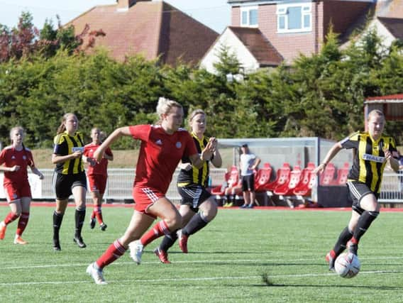 Chloe Lelliot breaks forward to score