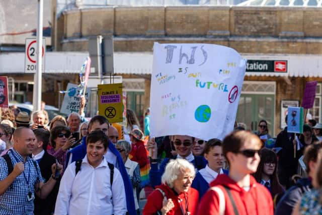 Protesters in Eastbourne as part of the Global Climate Strike  Credit: SEUK News/Alamy Live News. (Photo by Pete Abel)