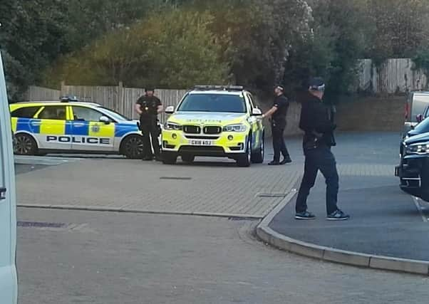 Armed police in Lovat Mead, St Leonards