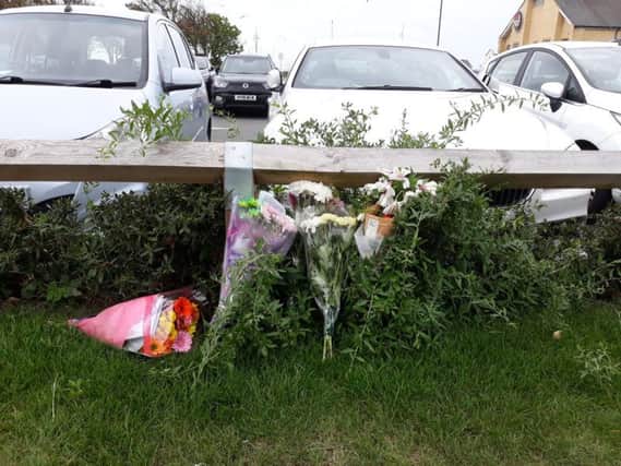 Flowers have been laid in Belmont Street today (Monday). Photo: Kate Shemilt
