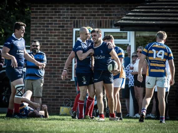 Cranleigh celebrate scoring against Worth Old Boys. Picture by Mark Cunningham Photography