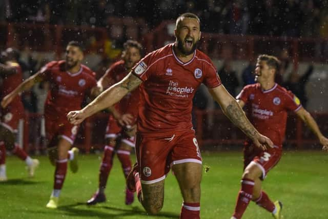 Ollie Palmer celebrates his winning penalty