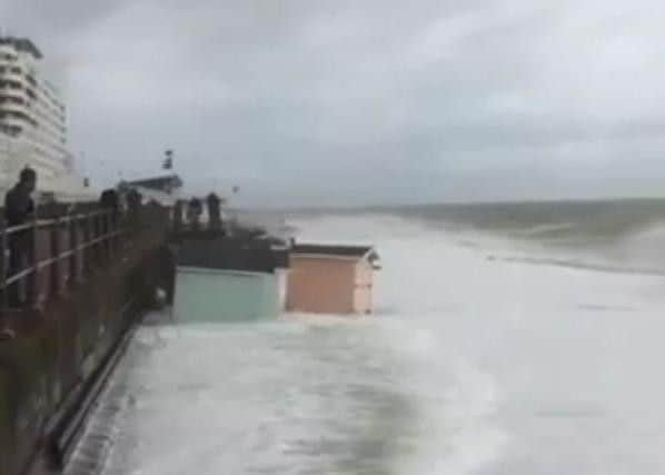 A beach hut is swept away as heavy rain and winds hit St Leonards. Picture taken from Dylan Reynolds' video