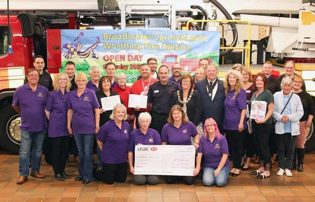 Cheque presentation at Worthing Fire Station. Picture: Eddie Mitchell.