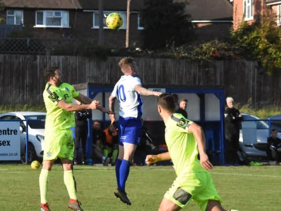 Action from United v Town. Picture by Grahame Lehkyj