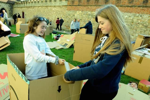 ks190574-1 Stonepillow Sleep Out  phot kate
Alice Cortina, 14, and Holly Woodruff, 14 making their shelter.ks190574-1 SUS-191019-222932008