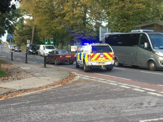 The two cars at the scene this afternoon