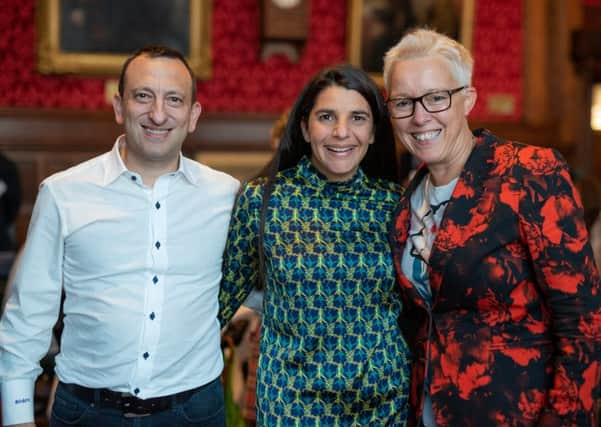 Brighton Chairman, Tony Bloom, with wife, Linda, and Caroline Clarke at the House of Commons, courtesy of bigloveweddings