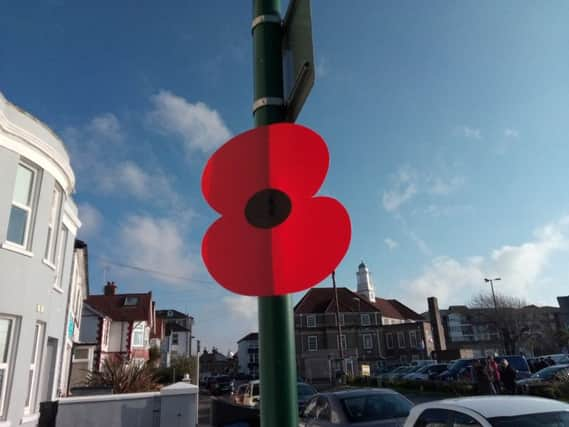 Giant poppies marked the way for the parad