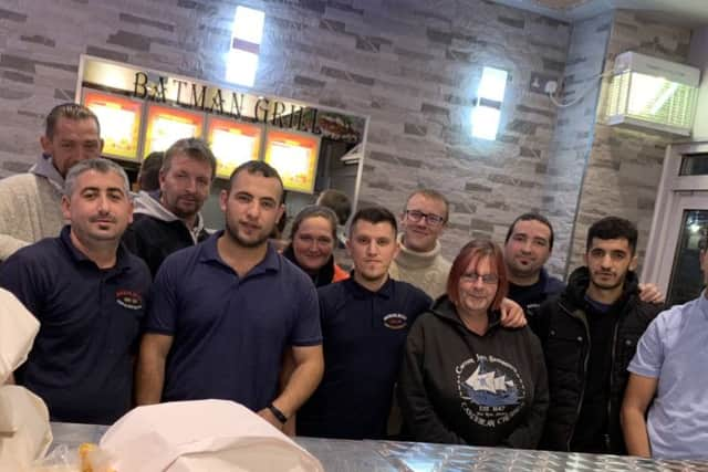 Staff at Batman Grill in St Leonards SUS-180511-112525001