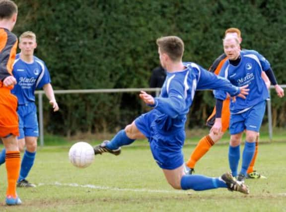 Jack Bingham shot is blocked, but Mark Lee scored from rebound to put Selsey 1-0 up against second place Ringmer at High Street Ground.