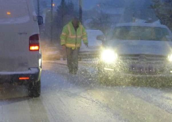 Valebridge Rd Burgess Hill driver gets help pic Phil Dennett