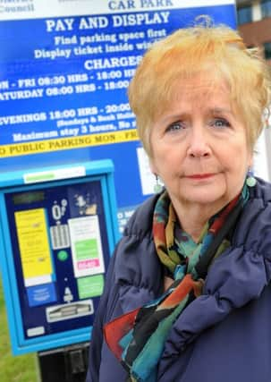 JPCT 130313 S13110893x Sarah Briffett speaks out against high car parking charges in Horsham -photo by Steve Cobb