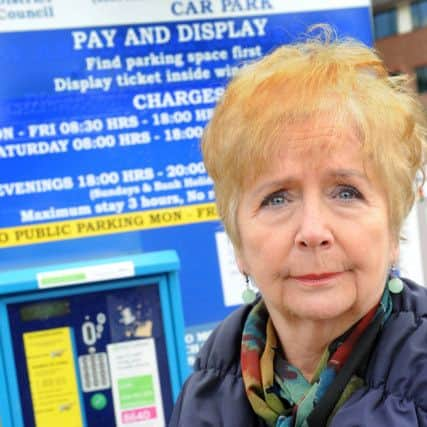 JPCT 130313 S13110893x Sarah Briffett speaks out against high car parking charges in Horsham -photo by Steve Cobb