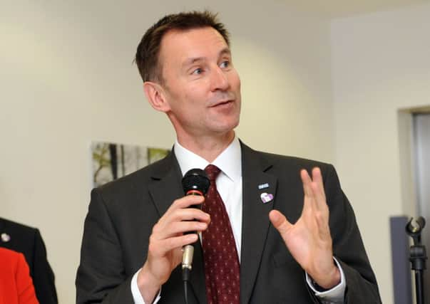 W13001H13-Hunt-  W13024H13-Hunt  210313  LP

Jeremy Hunt. Secretary of State for Health, Jeremy Hunt MP, visits Worthing Hospital to officially open a new clinical block. Pictured is Jeremy Hunt with Marianne Griffiths, Chief Executive of West Sussex Hospitals NHS Trust.