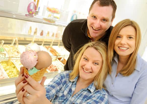 JPCT 180313 Sugar and Snow ice cream palour opening in Piries Place, Horsham. L to R  Owners Rachel and Stephen Imhoff and left,Sylwia  Reed. Contac Photo by Derek Martin