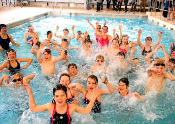 JPMT 290313 Swimarathon at Dolphin Leisure Centre, Haywards Heath. Children from Harlands Primary School, Haywards Heath. Photo by Derek Martin