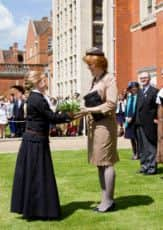 Flora Thwaites presents a posy to the Lady Mayoress. Picture by Nick Panagakis