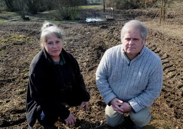 jpco-20-2-13-Judy Barker and Richard Symonds at Ifield Brook Meadow (Pic by Jon Rigby)