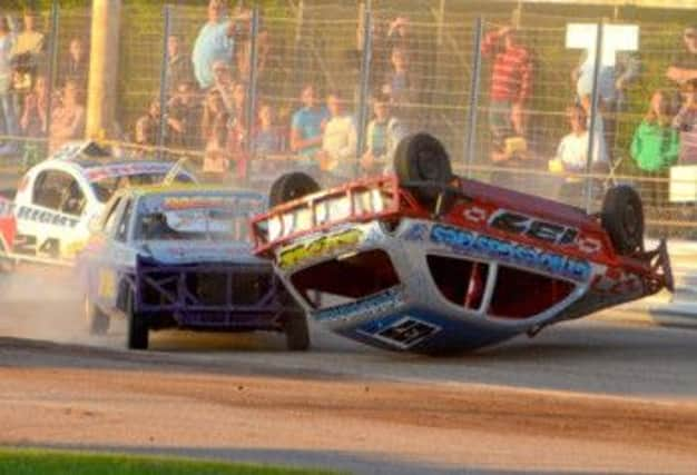 Curtis Tebbenham takes a tumble in the 1300cc Stock car class. - courtesy of Racepixels.co.uk.JPG