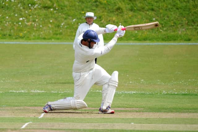 Haywards Heath v Lindfield (bowling). Callum Smith in action