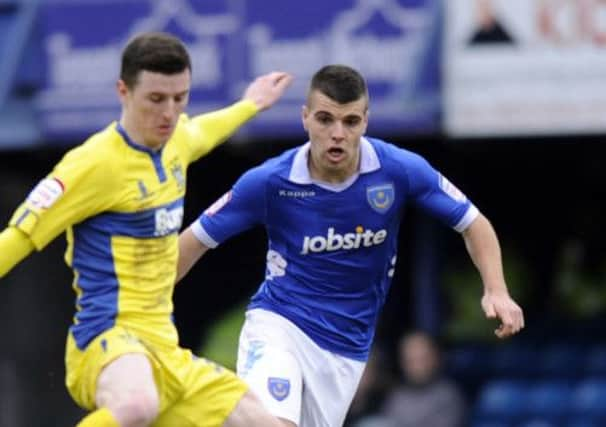 Liam Walker, right, will not be with Pompey on Monday as he is on international duty with Gibraltar