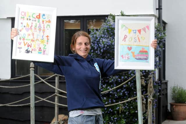 Anna Seager, of Little Crab Designs, with some of her nursery pictures W28044H13