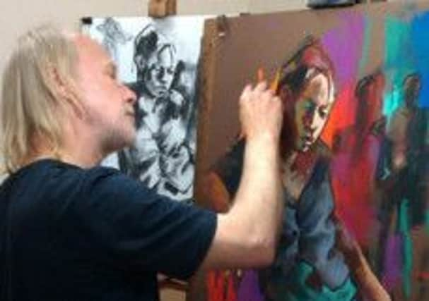 Hagop Kasparian demonstrates his painting style