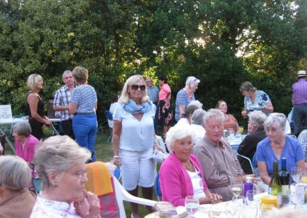 Carol Molineaux enjoying the Rotary barbecue in Grand Avenue