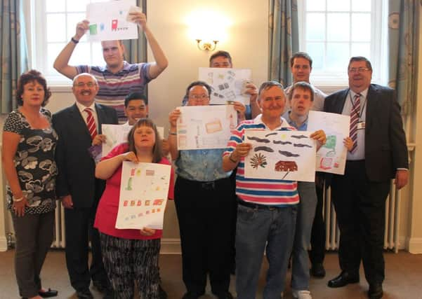 Image caption: Jill Hardie (furthest left) with Cllr Andrew Baldwin (second on left) with the poster designers, Horsham District Councils Litter and Cleansing Manager Nick Wallace-Jones (second from right, at the back) and Cllr Duncan England (furthest right), Horsham District Councils Deputy Cabinet Member for the Environment.