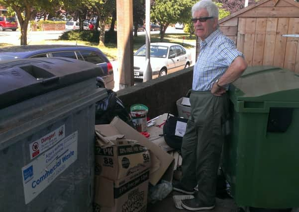 Ben Gorter with the mound of rubbish before it was cleared