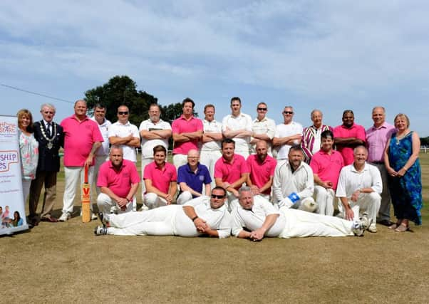 The teams line up for the Arun councillors versus officers charity match