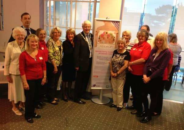 Philip Circus with members of the Horsham branch, together with their Chairman, Caroline Lucas, and Nick Mowatt.