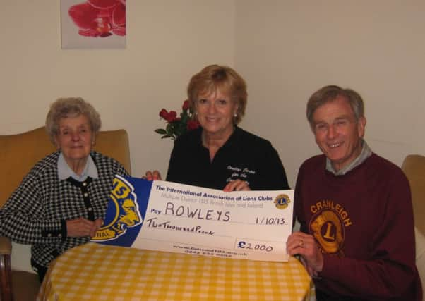 Rowleys client Olive Sprules, Rowleys manager Christine Napthine and Classic car show chairman Michael Meek