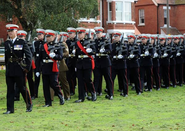 Royal Marines as they enter Caffyns field        L41275H13