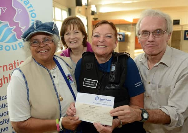 S41672h13

International Neighbours Cheque. CPO Rosie Hilll presents the cheque to Anne Bello Treasure of Internation Neighbours (left) with Penny Joseph and Tony Day