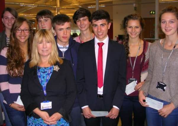 Dr Jackie Johnston with students (left to right) Grace Maxted, Natasha Kingdon, Sebastian Chenery, Aiden Marks, Hugh Crook, Samuel Holden, Lydia Wilson and Sophie Dawson