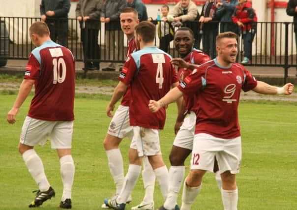 Jordan Woodley celebrates scoring for Hastings United against Horsham on Saturday. Picture by Terry S. Blackman