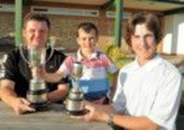 Winners Joshua McCartain and Joshua Strudwick with Littlehampton GC pro Stuart Fallow