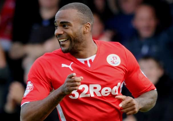 Crawley Town's Emile Sinclair scores against Bradford City (Pic by Jon Rigby)