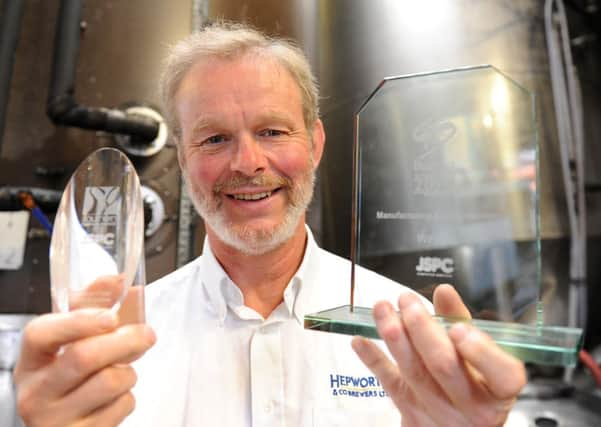 JPCT 071013 Andy Hepworth of Hepworth brewery with Business matters awards. Photo by Derek Martin